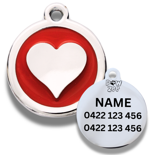 Pet tag with red heart design and engraving area on a white background