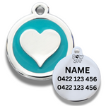 Pet tag with heart design and engraving area on a white background