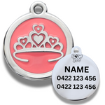 Pet tag with pink background and tiara design with engraved text
